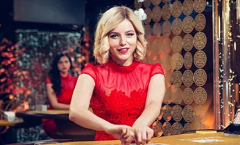 Biểu tượng cá cược trực tiếp với đồng hồ và biểu đồ, thể hiện tính năng cược theo thời gian thực.